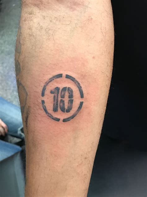 Need cool numerals for your racing site or sports blog? Number 10 number stamp wrist tattoo | Number tattoos ...