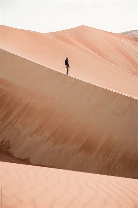 Man Exploring The Desert By Stocksy Contributor Mauro Grigollo