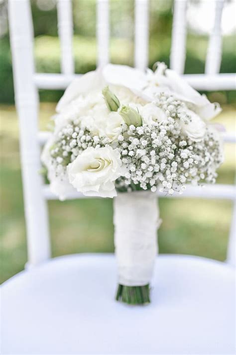 All White Bridal Bouquet With Babys Breath Eustomas And Phaleanopsis
