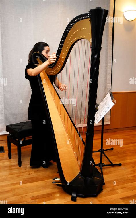 Playing Harp Hi Res Stock Photography And Images Alamy
