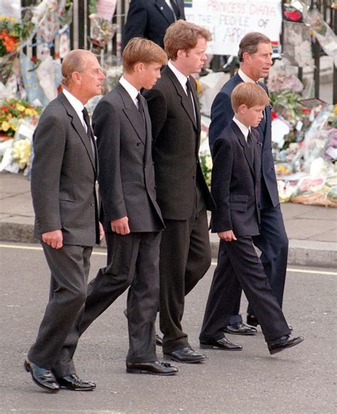 princes william harry walk together at prince philip s funeral good