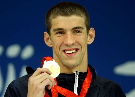 Michael Phelps With All His Olympic Medals