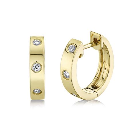 Three Stone Diamond Huggie Hoop Earrings In K Yellow Gold Bailey S Fine Jewelry