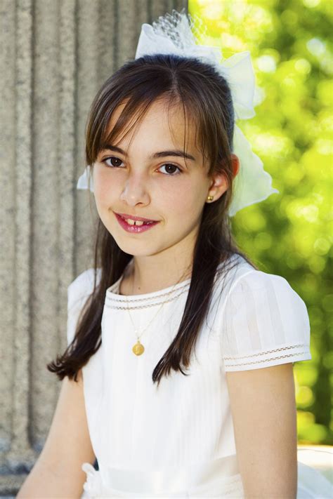 Get your hair cut into side swept bangs and get the bangs colored with some soft highlights. 28 Easy First Communion Hairstyles for Girls That Stole Our Heart - Hair Glamourista
