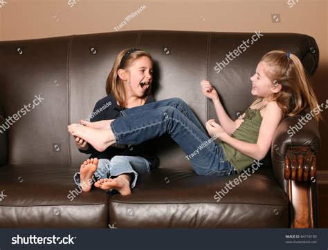 Cute Little Girl Tickling Sisters Feet Stock Photo 84718189 Shutterstock