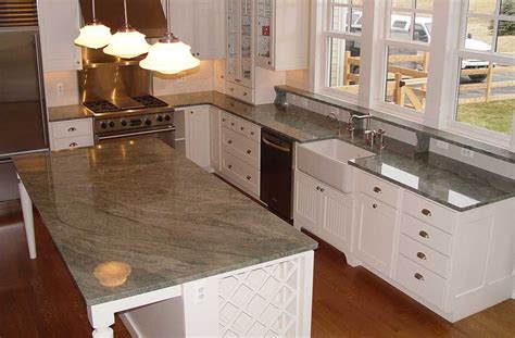 Backsplash ideas for kitchens with white cabinets. Residential Granite Countertop Installation - Royal Granite
