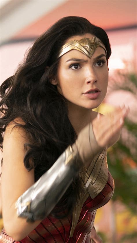 Girls easily can be heroines of some city sci fi story, not just faceless goons from beat'em up. Actress Gal Gadot In Wonder Woman 1984 4K Ultra HD Mobile Wallpaper