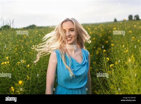 Young Beautiful Woman In The Fields Stock Photo Alamy