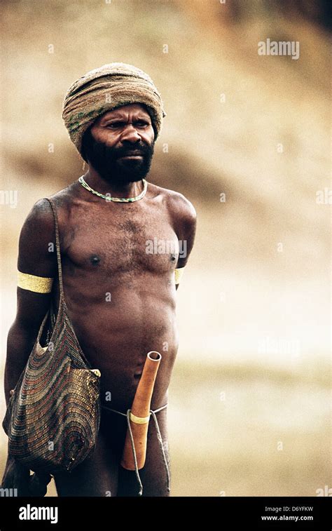 Indigenous Man Wearing Turban Carrying Knit Bag Over Shoulder Gourd Tied Waist Irian Jaya New