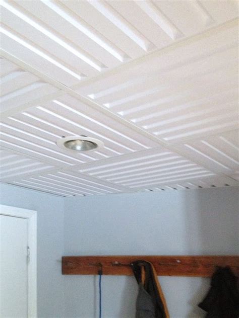 How to install a tin tile ceiling. Modern installation featuring Southland Ceiling Tiles in a ...
