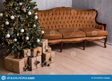 decorated christmas tree heap of ts and copy space over wooden floor stock image image of