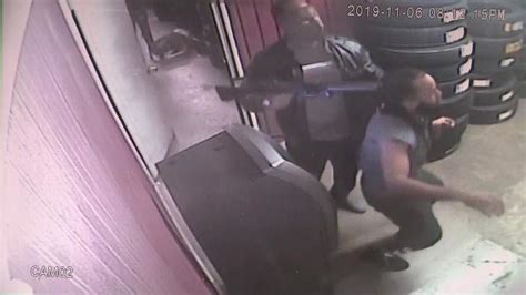 Terrifying Video Shows Houston Tire Shop Employees Held At Gunpoint Dragged Around Shop
