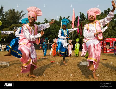 Punjabi Bhangra Dancers During A Colorful Festival In Punjab Stock