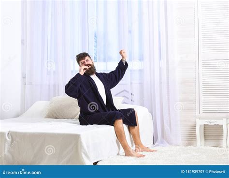 Guy On Sleepy Face Yawning And Stretching Awakening Concept Stock