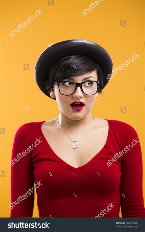 Beautiful Girl With A Astonished Expression Wearing A Hat
