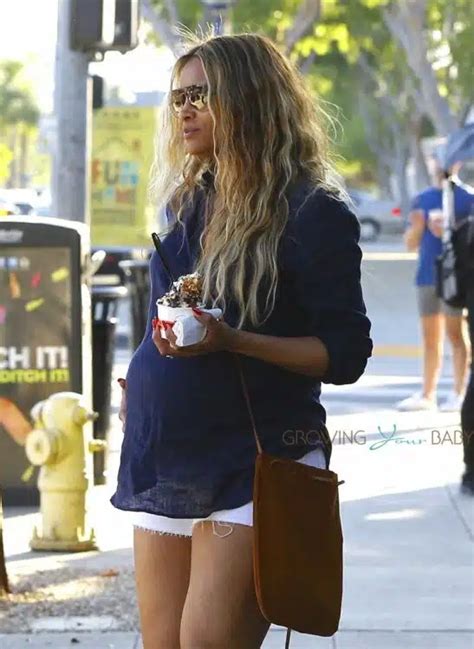 Russell Wilson And A Pregnant Ciara Shop In Style