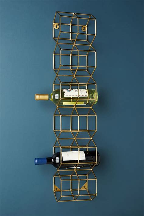 In stores this rack is ideally used to make a feature of certain sections of clothing and stands out when used with other types of wall mounted clothes rails. 12 Best Wine Racks - Stylish Ways to Display Wine Bottles ...