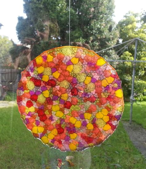 Suncatchers Made From Brightly Coloured Plastic Beads And Melting Them