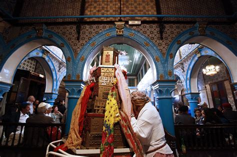 A Jewish worshipper prays during a pilgrimage to the El Ghriba synagogue in Djerba, Tunisia ...