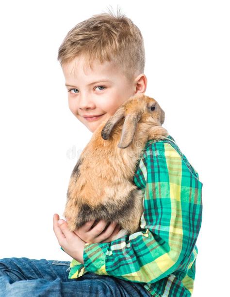 Boy Holding Rabbit On Hand Isolated On White Background Stock Photo