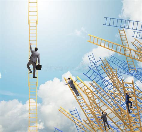 Businessman Climbing Career Ladder In Business Concept Stock Photo