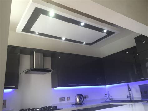 To create a floating effect around the perimeter between the wall and the ceiling, there should be a small gap in which the backlight will be installed. Kitchen lighting. LED strips under cabinets and on kick ...