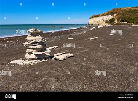 The Black Sand And White Limestone Of Nape Nape Beach Canterbury New