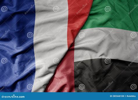 Big Waving Realistic National Colorful Flag Of France And National Flag Of United Arab Emirates
