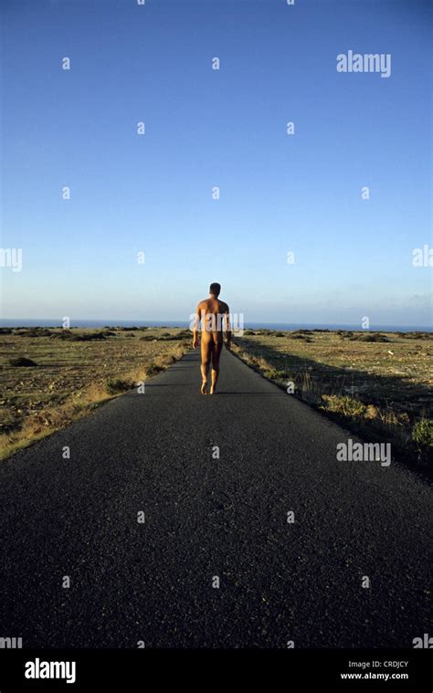 Naked Man Walking On Path Spain Balearen Formentera Stock Photo Alamy