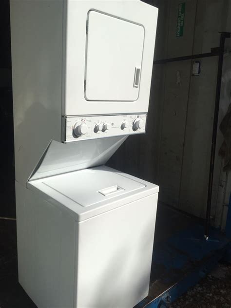 Ge 24 Wide Stackable Combo Washer Dryer Works Perfect Has Dent On Top