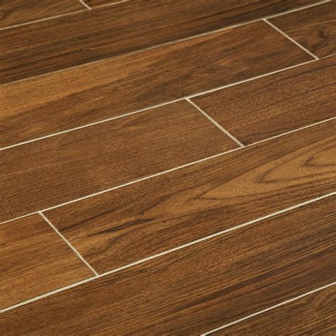 Photo by johnson + mcleod design consultants. Manor 6" x 36" Porcelain Wood Look Tile | Wayfair