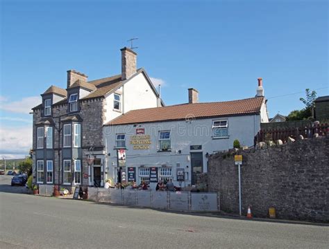 View Of The Ye Olde Fighting Pub In Arnside In Cumbria With People
