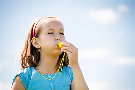 1800 Child Blowing Whistle Stock Photos Pictures And Royalty Free