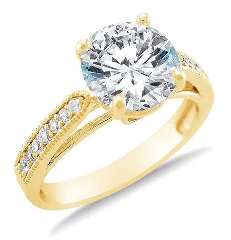 If you compare a real diamond to a fake diamond like cubic zirconia, you are able to notice a drastic difference in the white and colored light sparkle that the real diamond gives off. 14K Yellow Gold CZ Engagement Rings | Fake Diamond ...