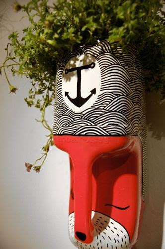 Repurpose And Recycle Old Used Plastic Milk Cartons Into