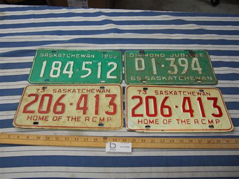 4 Vintage License Plates