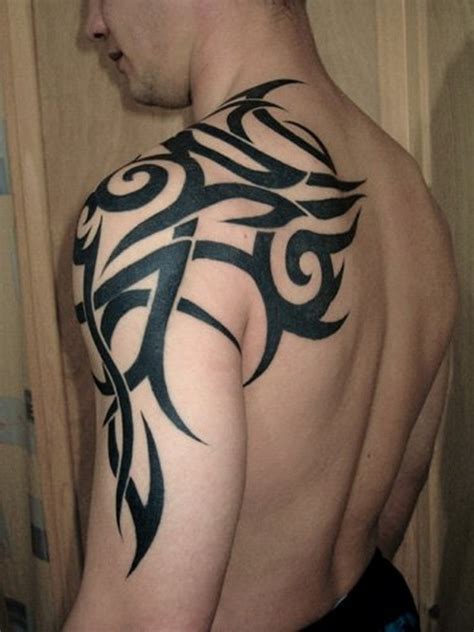 It looks best on the torso and shoulders when you choose a bird, an egyptian symbol, or an angel. 27 Beautiful Tribal Shoulder Tattoos