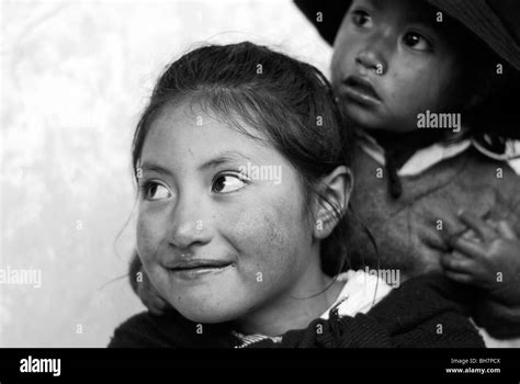 Ecuador Latacunga Close Up Of A Girl Ith Her Big Bright Brown Eyes And Smiling Her Cheeks