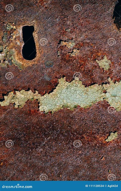 Texture Of Rusty Iron Cracked Green Paint On An Old Metallic Surface