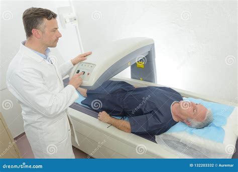 Male Patient Getting Xray In Examination Room Stock Photo Image Of
