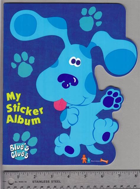 A Blue Dog With Paw Prints On Its Face And The Words My Sticker Album