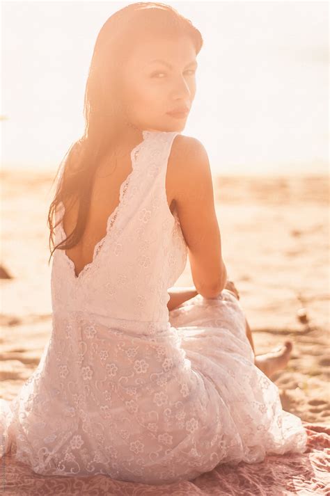 Gentle Beautiful Woman At Sunset Beach By Stocksy Contributor Alexander Grabchilev Stocksy