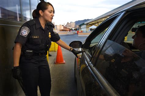 Us Customs And Border Protection Cbp Officer Talks To Car Driver At Border Homeland Security