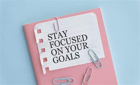 Stay Focused On Your Goals Text On Notebook And Pen Stock Image