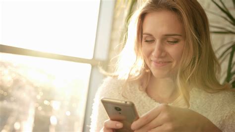 Smiling Woman Texting Sms On Smartphone Happy Woman Holding Phone Ant