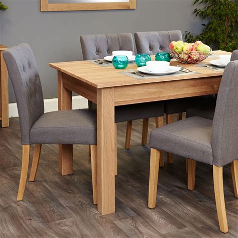 Florence grey marble extending dining table with 6 kensington grey velvet fabric chairs. Mobel Oak 4-6 seat table and 6 grey chairs Was £1,099.00 Now £899.00 - Wooden Furniture Store