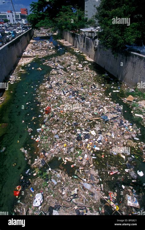 garbage trash raw sewage unsanitary water polluted water polluted waterway pollution