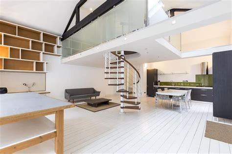 Spiral Staircase Leading Up To Mezzanine Bedroom Mezzanine Bedroom Home Rental Apartments