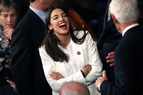 Alexandria Ocasio Cortez Laughs As She Apologizes To Donald Trump Jr