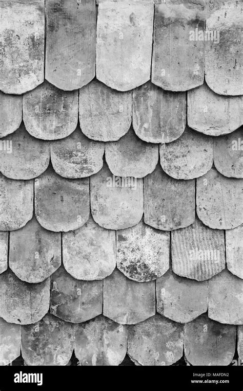 Close Up Of Old And Weathered Roof Tiles Texture Background In Black